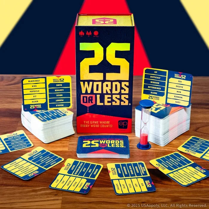 Navy box with a large yellow 25, stacks of word cards, and a blue sand timer on a wooden surface.