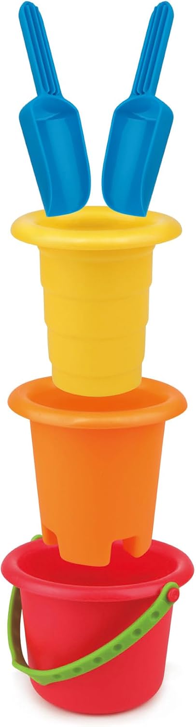 Stacked sand toys: two blue scoops on top of a yellow mold, orange castle mold, and a red bucket with a green handle.
