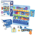 Blue toy grocery stand with alphabet shelves, a blue shopping cart, and miniature food items labeled A through Z.