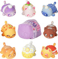 Eight colorful cat-shaped dessert squishies surrounding a purple cat-shaped mystery container.
