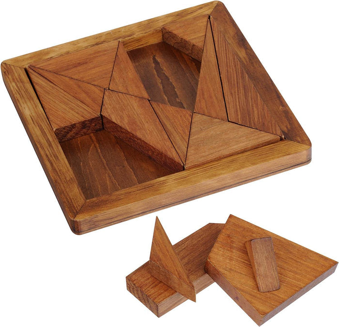 Wooden tangram puzzle with triangular and geometric pieces partially assembled in a rectangular wooden tray.