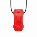 A bright red sports car-shaped pendant with textured wheel details, hanging vertically from a black cord.