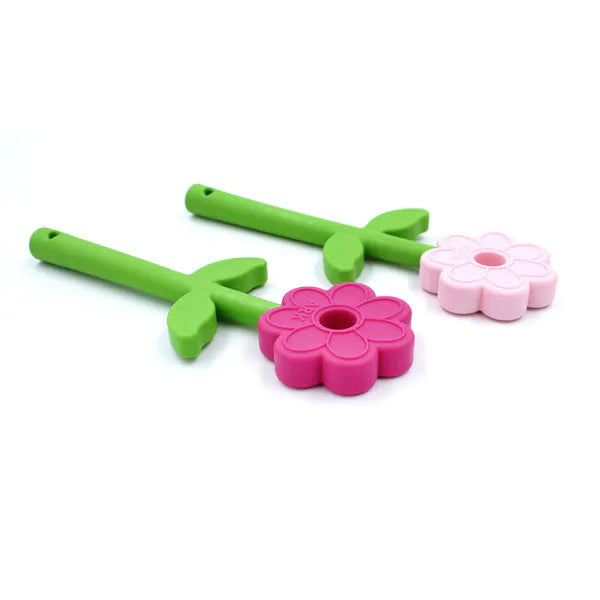 Two silicone flower wands with green stems and leaves. One flower is dark pink and the other is light pink.