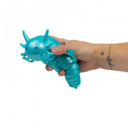 A hand holds a bright teal, segmented plastic axolotl fidget toy with small legs and six gills on its head.