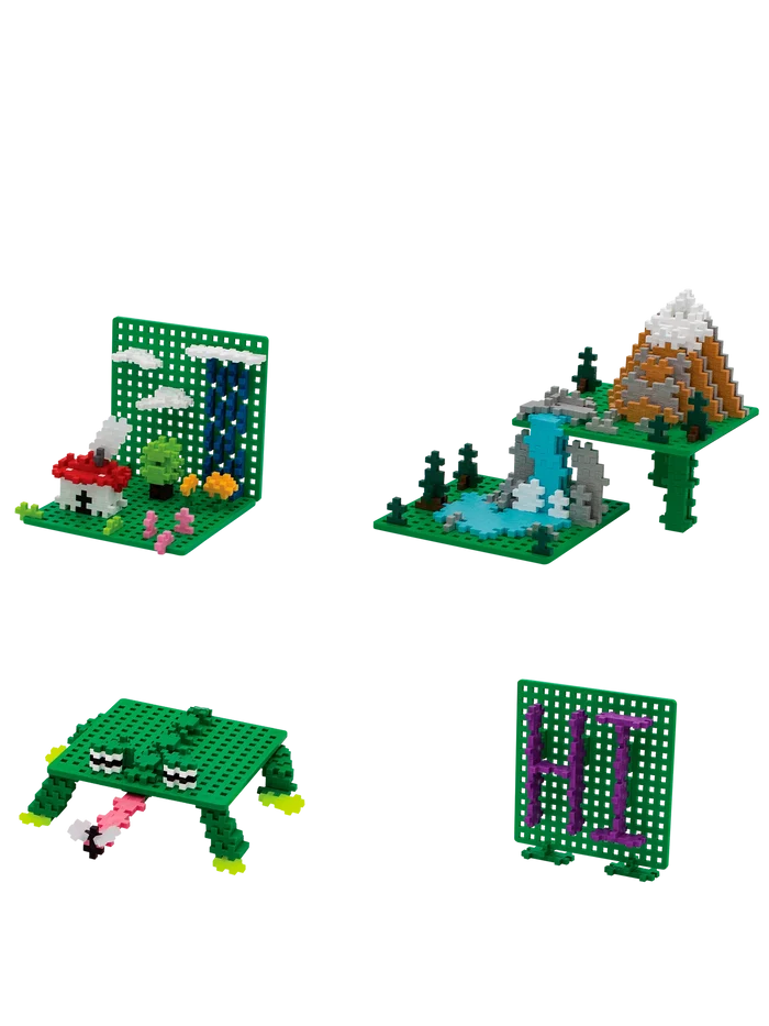Four creative builds like a mountain scene and a frog using green grid-style Plus-Plus baseplates.