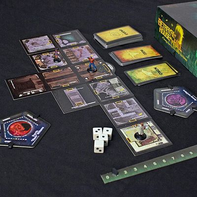 Board game with room tiles, miniatures, white dice, card decks, and character boards beside its box on a black background.