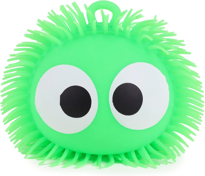 Round neon green puffer ball with soft rubbery spikes and two large white and black cartoonish eyes.