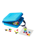 Open blue zippered case with colorful plus-shaped blocks and a small figure built on a white grid baseplate.