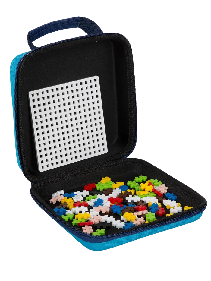 Open blue zippered case with handle, filled with colorful plus-shaped blocks and a white building baseplate.