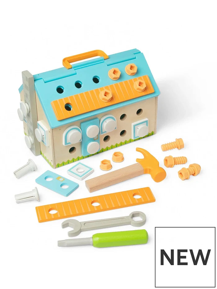 House-shaped wooden toolbox toy with blue roof, hammer, screwdriver, wrench, and colorful building accessories.