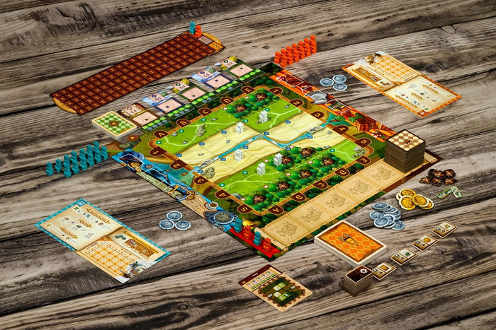 Colorful board game set up on a wooden surface with rabbit miniatures, map board, cards, and game tokens.