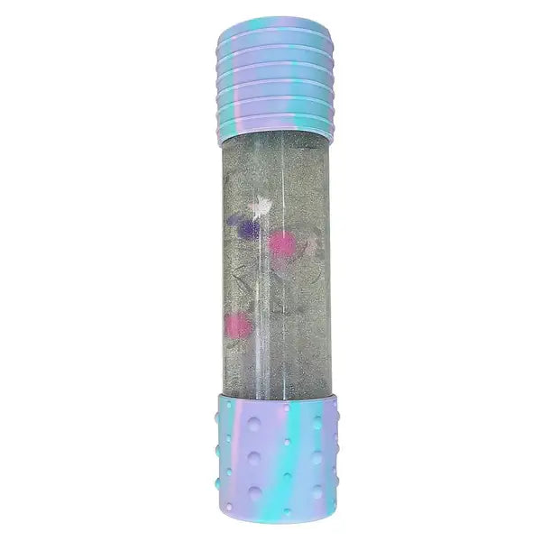Cylindrical sensory bottle with pastel marbled caps, silver glitter liquid, and colorful floating charms.