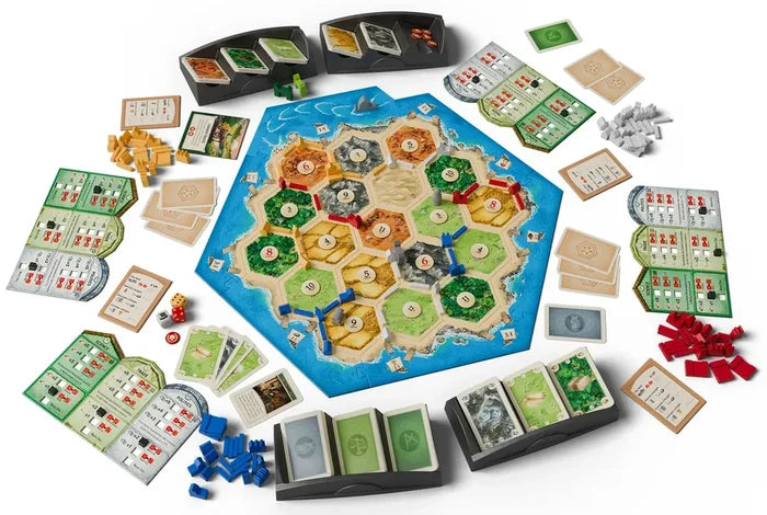 Overhead view of hex-tiled game board, colorful wooden pieces, decks of cards in trays, and folding player boards.