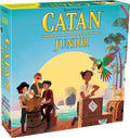 Catan Junior box featuring children on a sunny tropical dock with a large yellow sun, palm trees, and a parrot.
