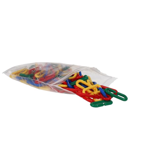 Red, yellow, green, and blue plastic chain links spilling out of a clear resealable storage bag.