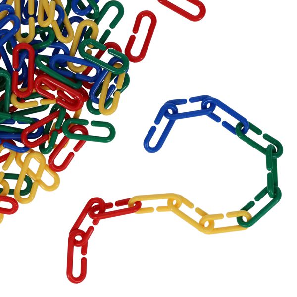 Red, yellow, blue, and green plastic links in a pile and connected in a chain on a white background.