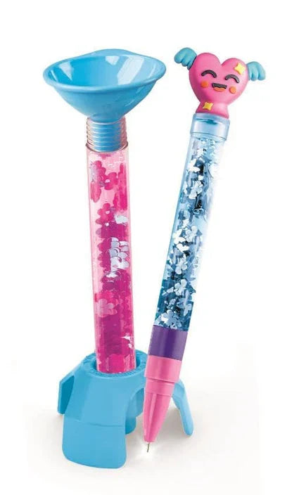 Two colorful glitter pens with a winged heart topper, filling funnel, and blue stand on a white background.