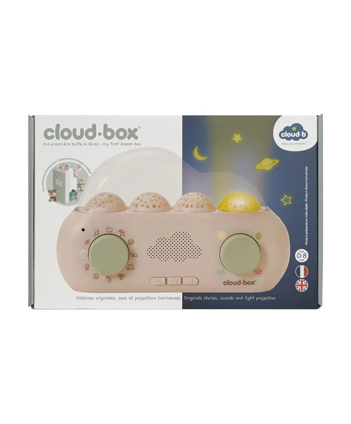 Boxed light pink Cloud Box storyteller with four projection domes, green knobs, and a cloud-shaped speaker.