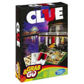 Black Clue box showing a mansion at night, a compact green travel board, and mystery character cards.