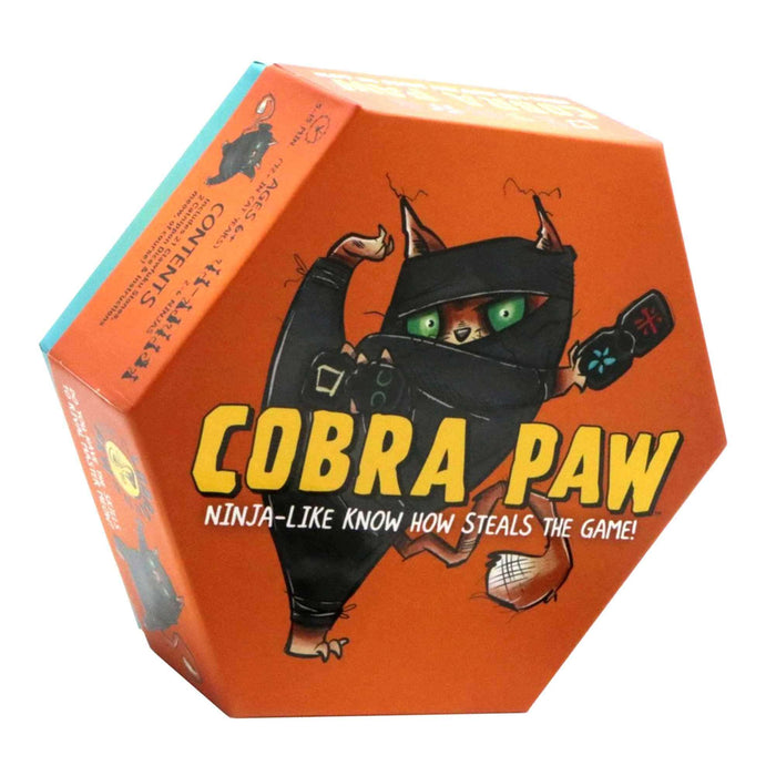 Orange hexagonal box for Cobra Paw game featuring a ninja cat illustration and bold yellow lettering.