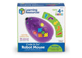 Purple electronic toy mouse with colorful buttons and green arrow cards on white and blue box packaging.