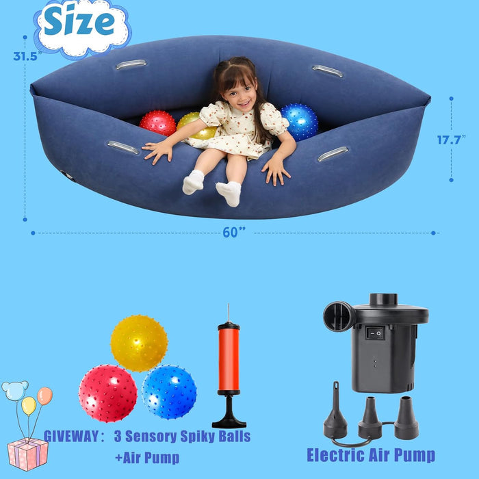 Child sitting in 60-inch blue inflatable sensory pod with spiky balls, manual pump, and electric air pump.