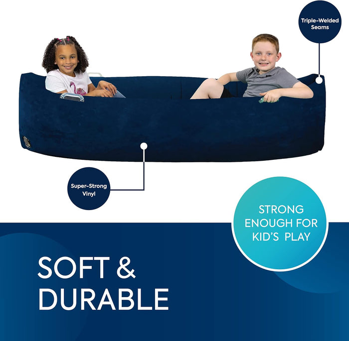 Two kids sitting in a long navy blue inflatable sensory pod with soft vinyl and triple-welded seams.