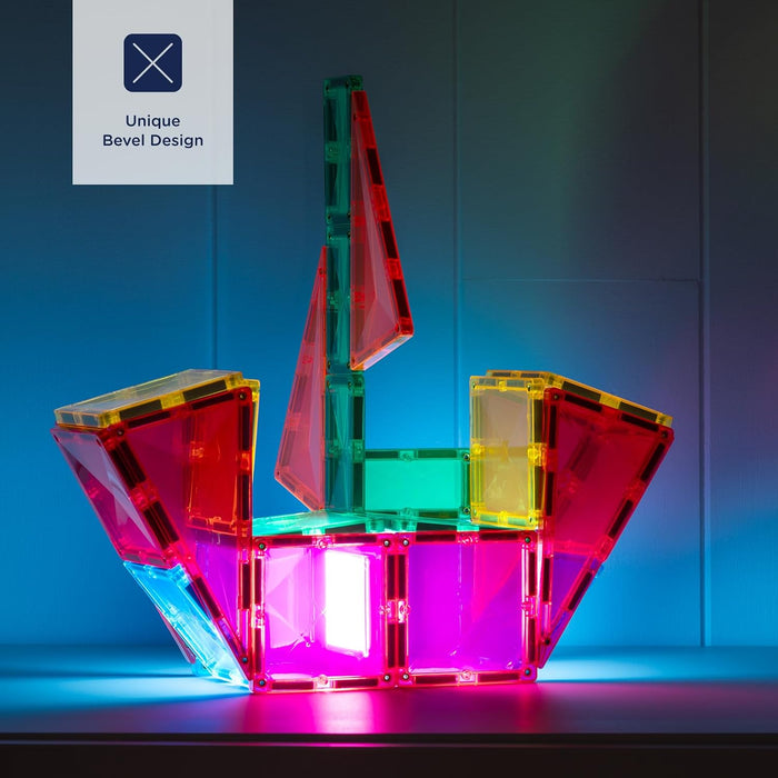 Glowing rocket built with translucent magnetic tiles in red, pink, and blue, featuring a unique bevel design.