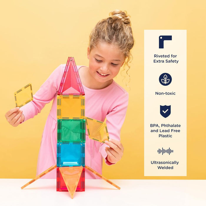 A child builds a rocket using colorful translucent magnetic tiles. Icons on the right highlight key safety features.