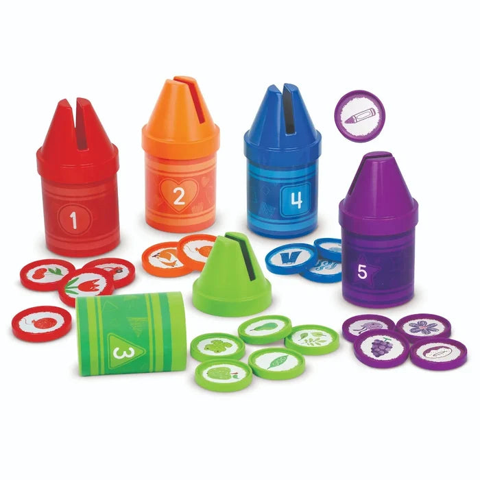 Five colorful numbered plastic crayons with matching illustrated sorting discs.