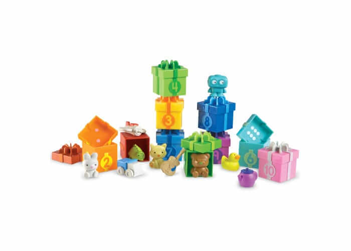 Colorful numbered toy gift boxes with removable lids and surprise figures like a bear, bunny, and toy car.