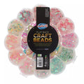 Clear flower-shaped organizer filled with assorted colorful flat back craft beads in fruit and geometric shapes.