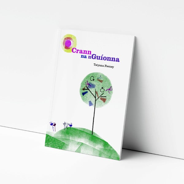 White book cover with a minimalist illustration of a green tree on a hill, colorful hanging tags, and purple title text.