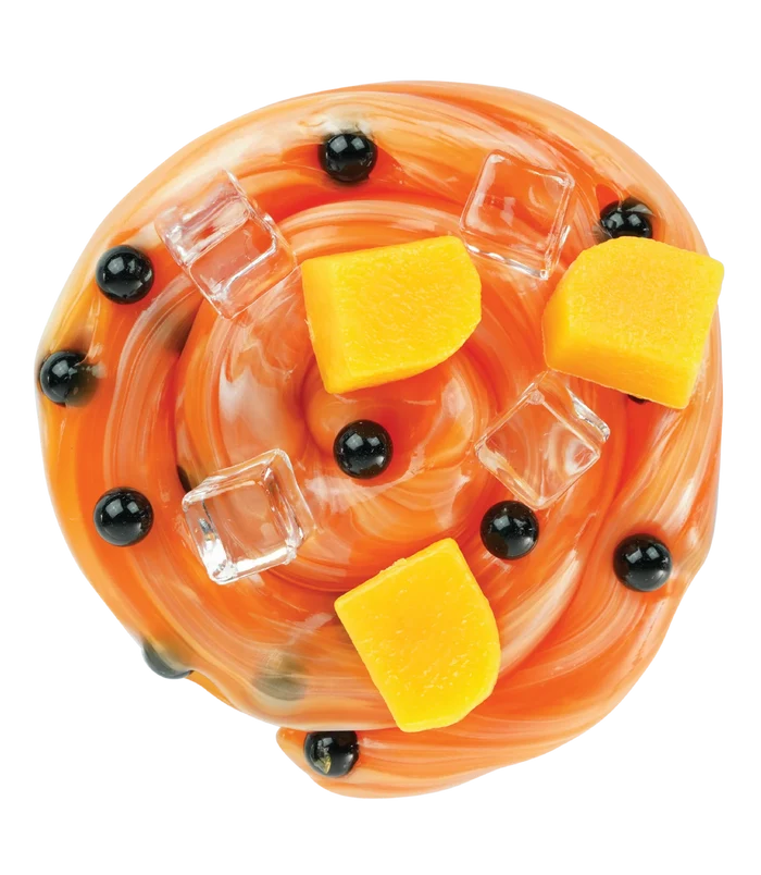 A swirl of orange putty mixed with black boba pearls, clear plastic ice cubes, and yellow mango chunks.