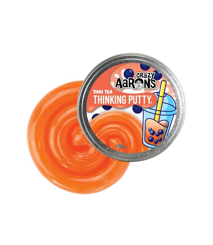 Bright orange glossy putty swirl next to a silver tin with a Thai Tea Boba illustration and Crazy Aaron's logo.