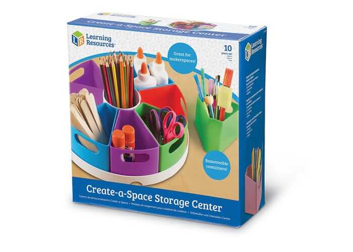 Packaging for a rotating desk carousel with eight colorful wedge bins and a central cup on a white circular base.