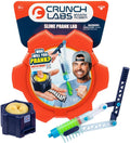 Orange packaging for a Slime Prank Lab featuring a blue mechanical launcher and a pot of yellow slime.