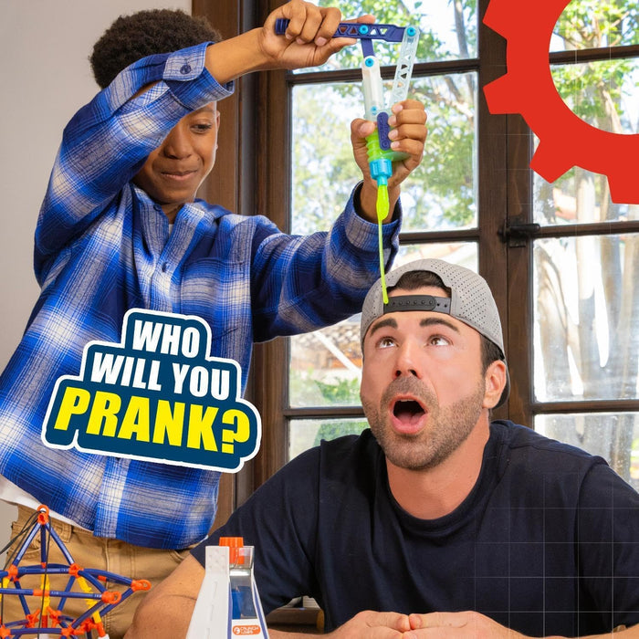 Boy drips yellow slime on a surprised man's head with a blue toy. Graphic text says, Who will you prank?