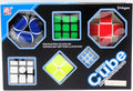 Black box containing a variety of colorful twisty puzzles including a green 3x3 cube and a yellow 2x2 cube.