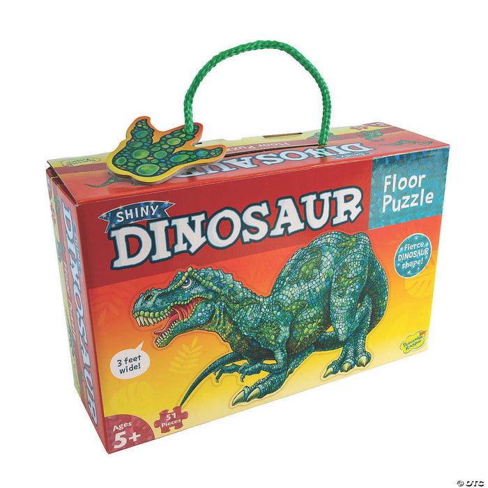 Dinosaur floor puzzle box featuring a shiny green T-Rex illustration, a green rope handle, and yellow background.