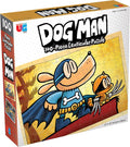 Box for a 100-piece Dog Man lenticular puzzle featuring a blue-suited dog and orange cat on a yellow background.