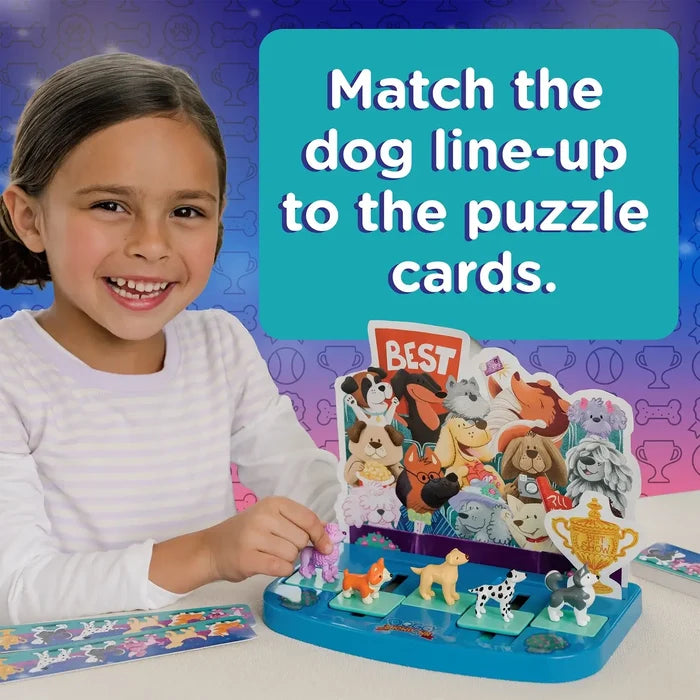 A girl matches five colorful toy dog figurines on a blue game base to logic patterns on illustrated puzzle cards.