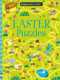 Bright green activity book cover featuring a winding yellow path, cartoon sheep, a blue bunny, and colorful Easter eggs.
