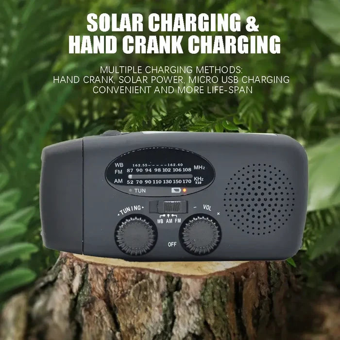 Emergency Radio with LED Lights Solar Charging Light featuring hand crank and multiple charging options displayed on a log.