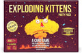 Maroon box of Exploding Kittens Party Pack featuring a cartoon yellow kitten exploding into a mushroom cloud.
