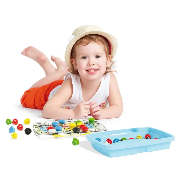 A child playing with a peg board toy set featuring colorful round pegs and a light blue tray on a white background.