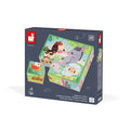 Dark grey box featuring 9 colorful cardboard cubes that form a farm animal puzzle with a cow, donkey, and sheep.