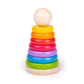 A conical stack of seven rainbow-colored wooden rings and one natural wood ball on a wide wooden base.