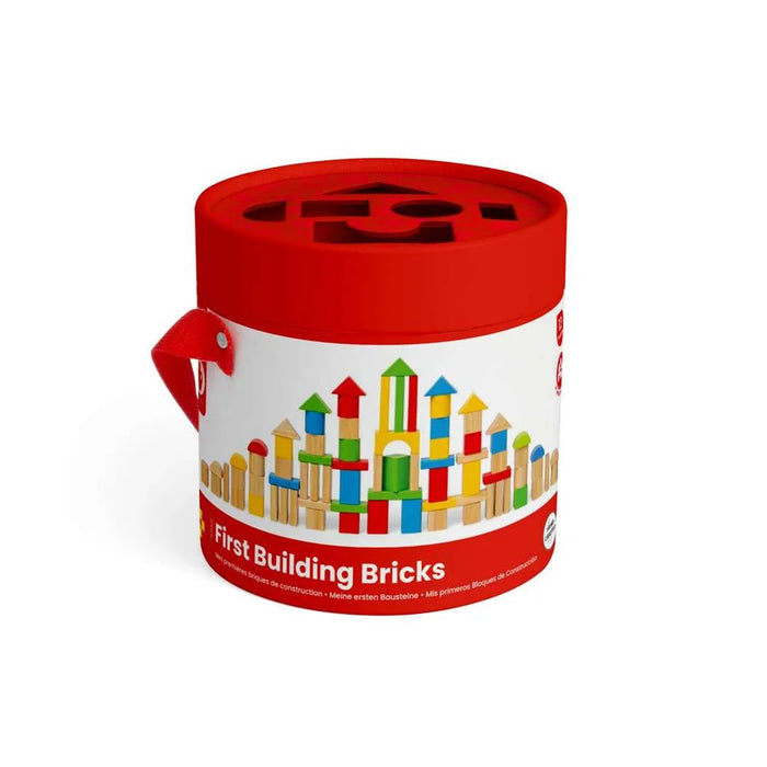 Red and white cylindrical tub for First Building Bricks featuring a castle graphic and a red shape-sorter lid.