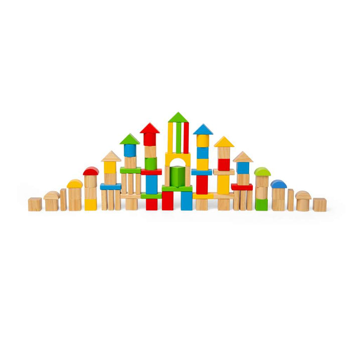 Colorful and natural wood building blocks in geometric shapes arranged in a tall, symmetrical peak.